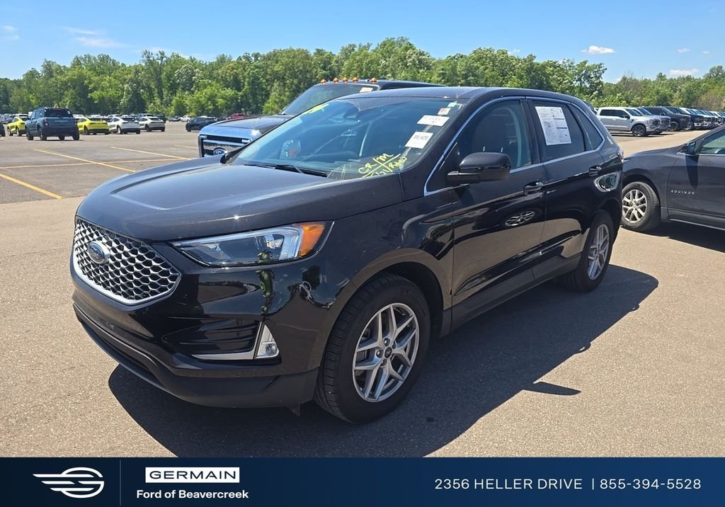 Used 2024 Black Metallic Ford SEL image 1
