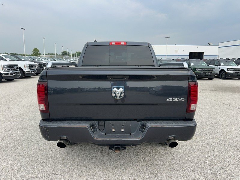 Used 2016 Granite Crystal Metallic Clearcoat Ram 4WD Crew Cab 140.5" Sport image 4