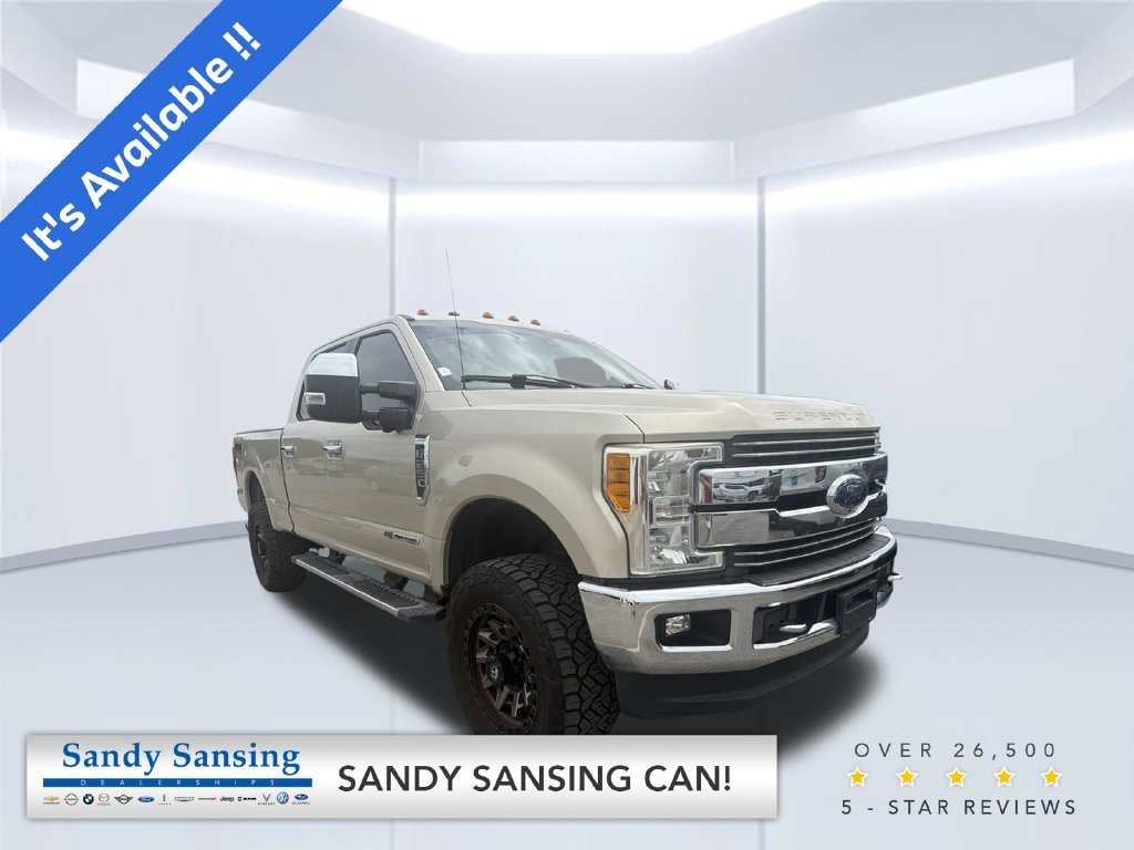 Used 2017 Gold Ford Lariat image 1