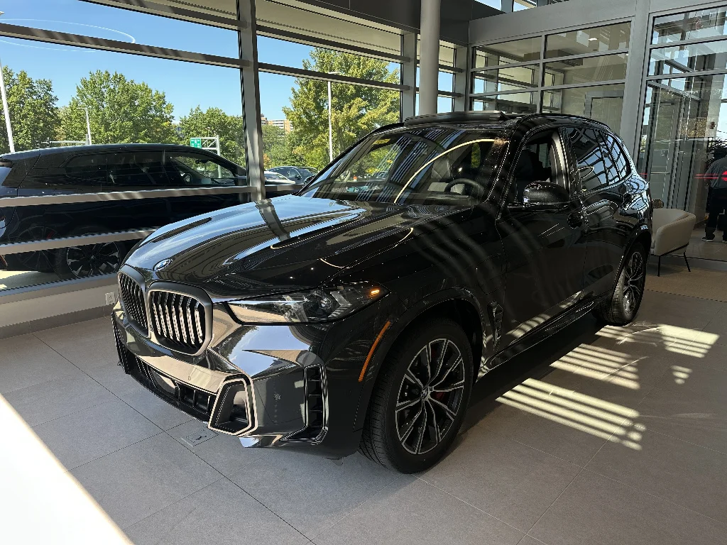 New 2026 Black Sapphire Metallic BMW xDrive50e image 3