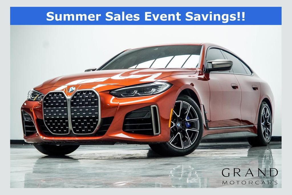 Used 2024 Orange BMW M440i xDrive image 1