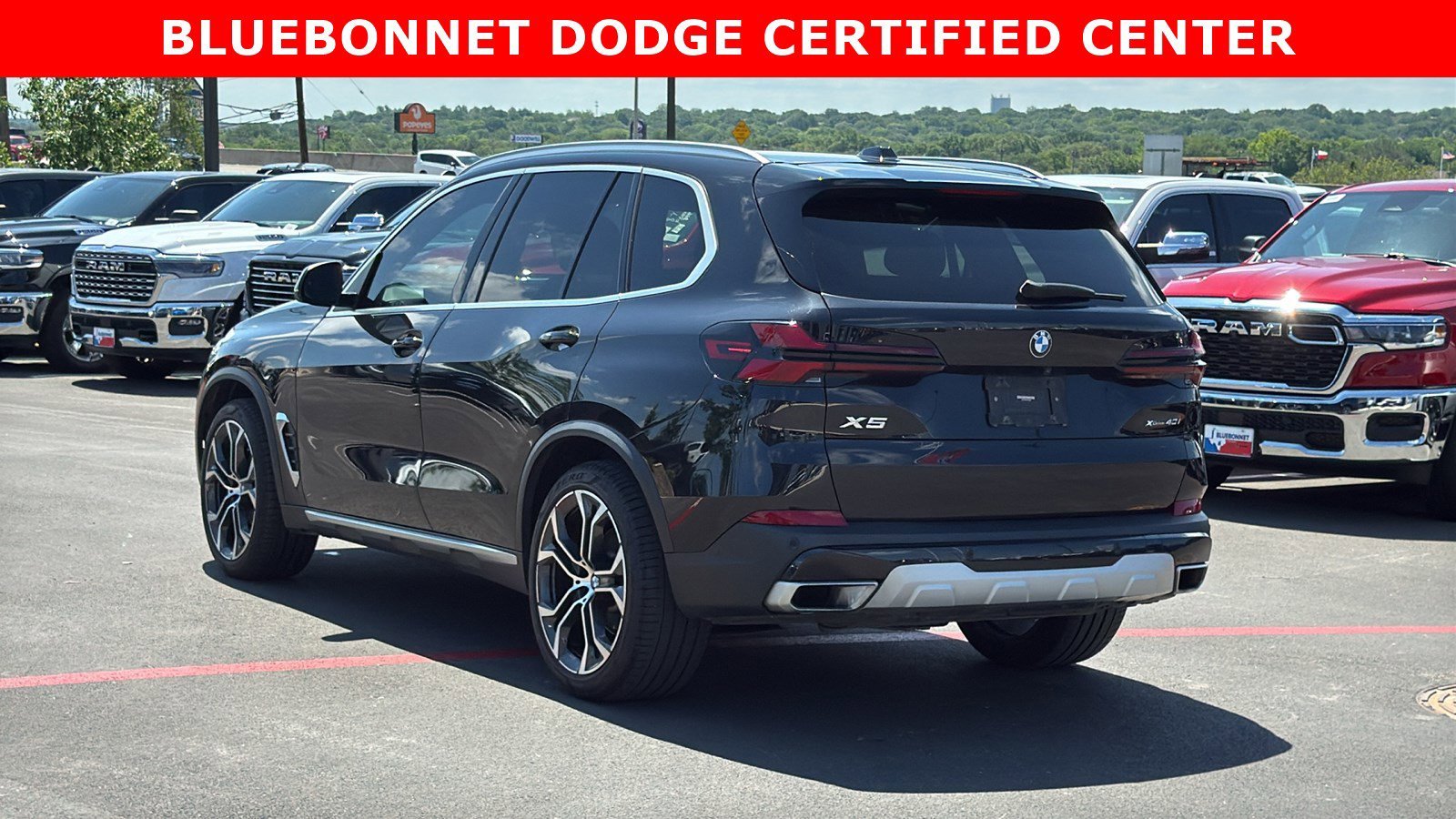 Certified Used 2024 Black Sapphire Metallic BMW xDrive40i image 3