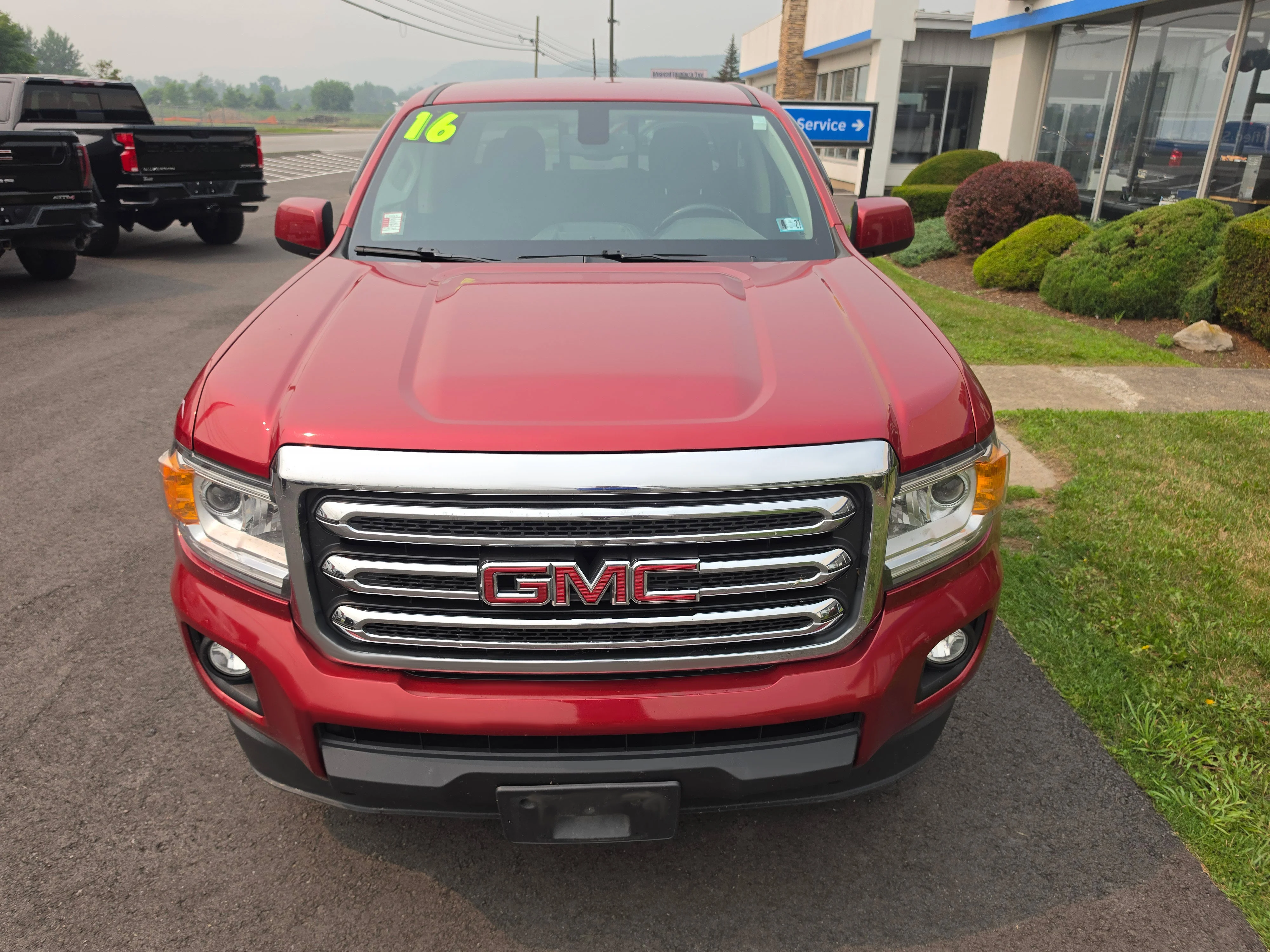 Used 2016 Copper Red Metallic GMC 4WD SLE image 9
