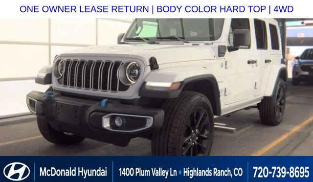 Used 2024 White Jeep Sahara 4xe image 1