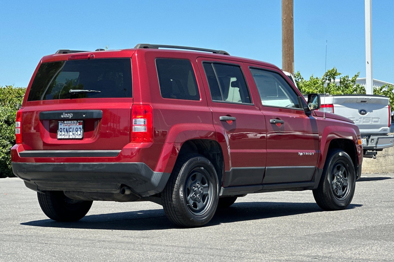 Used 2016 Deep Cherry Red Crystal Pearlcoat Jeep Sport image 4
