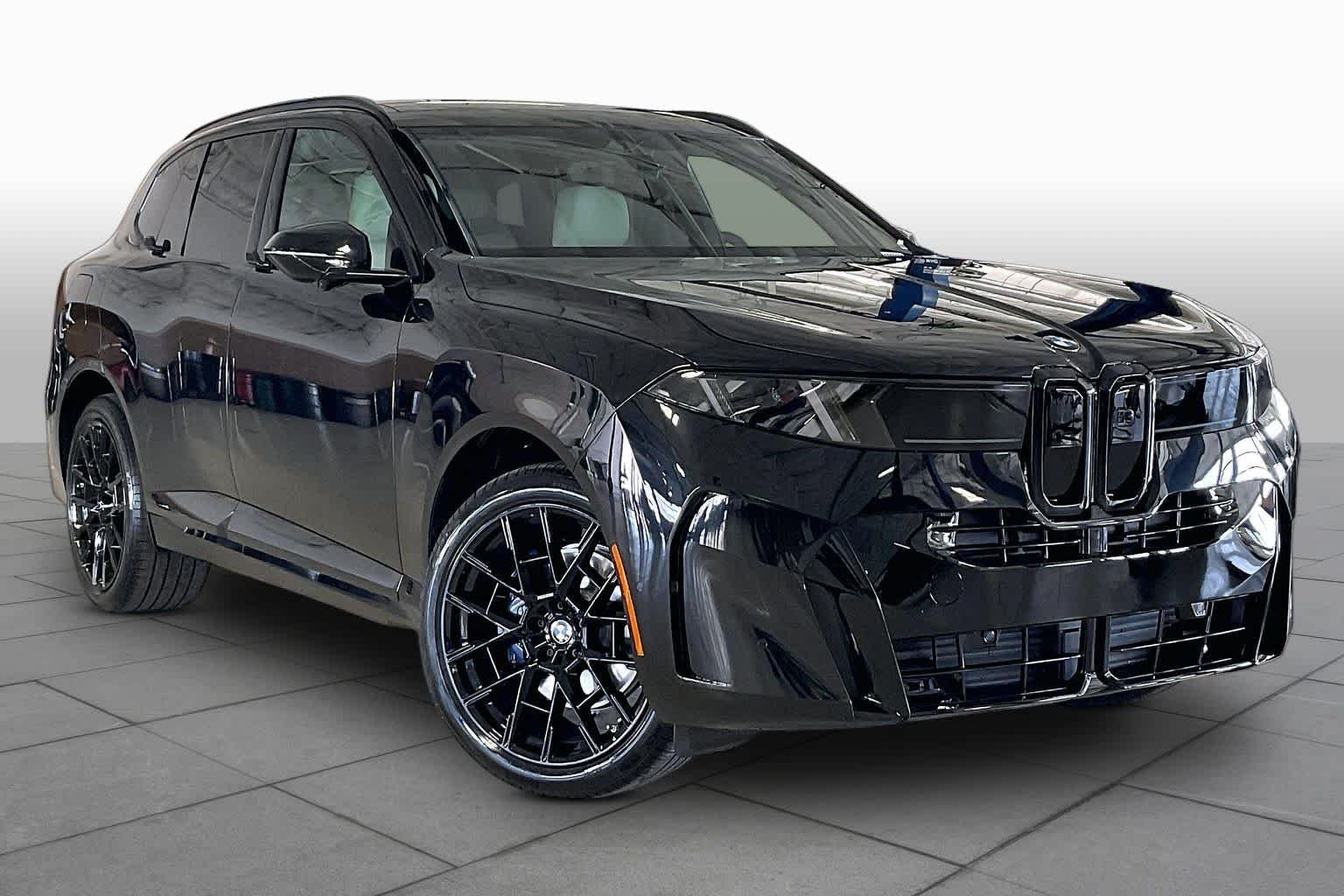 New 2027 Black Sapphire Metallic BMW 40 xDrive image 2