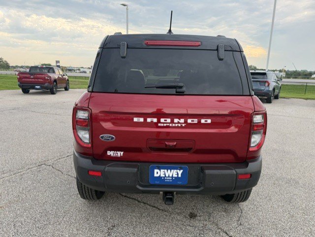 Used 2025 Ruby Red Metallic Ford Badlands image 6
