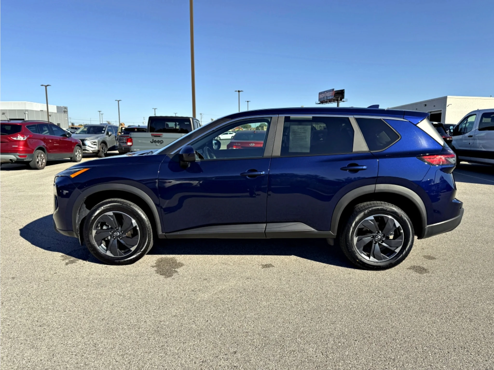 Used 2026 Deep Ocean Blue Pearl Nissan SV image 20