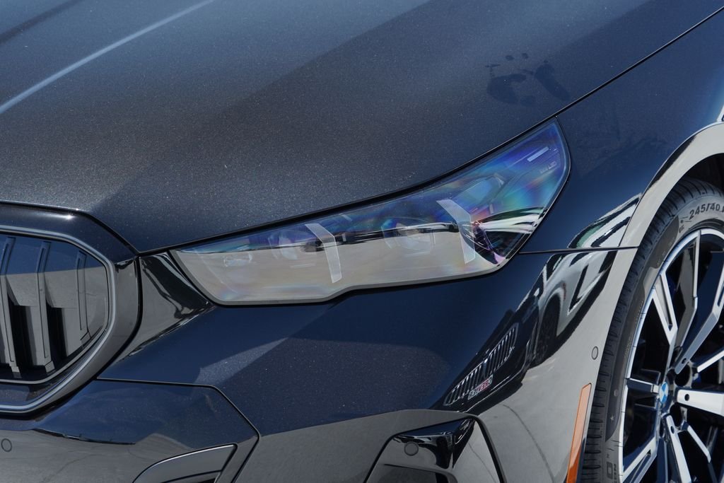 New 2027 Black Sapphire Metallic BMW 550e xDrive image 4