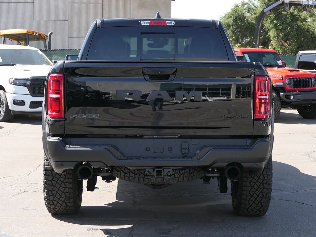 New 2026 Diamond Black Crystal Pearl Coat RAM RHO Crew Cab 4x4 5