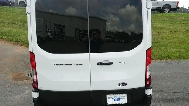 New 2026 Oxford White Ford Passenger Van XLT image 11