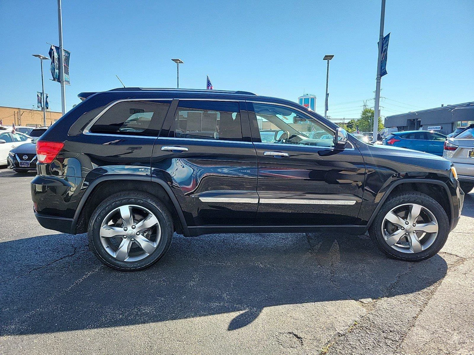 Used 2013 Brilliant Black Crystal Pearl Jeep Overland image 10