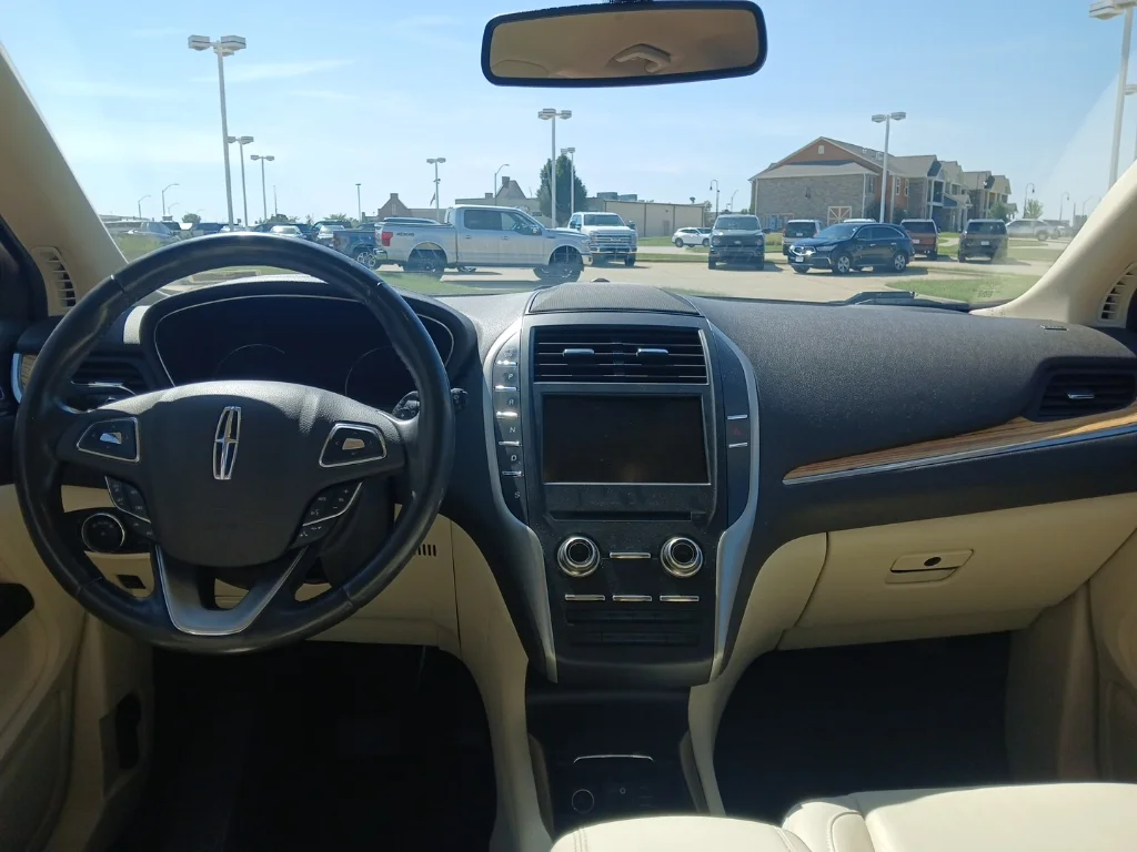 Used 2015 Lincoln MKC Base with VIN 5LMTJ2AH6FUJ10328 for sale in Pella, IA