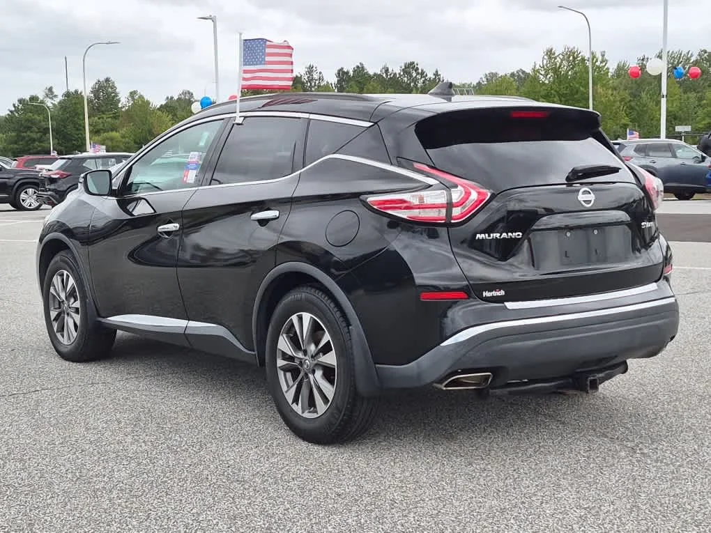 Used 2017 Magnetic Black Metallic Nissan SV image 4