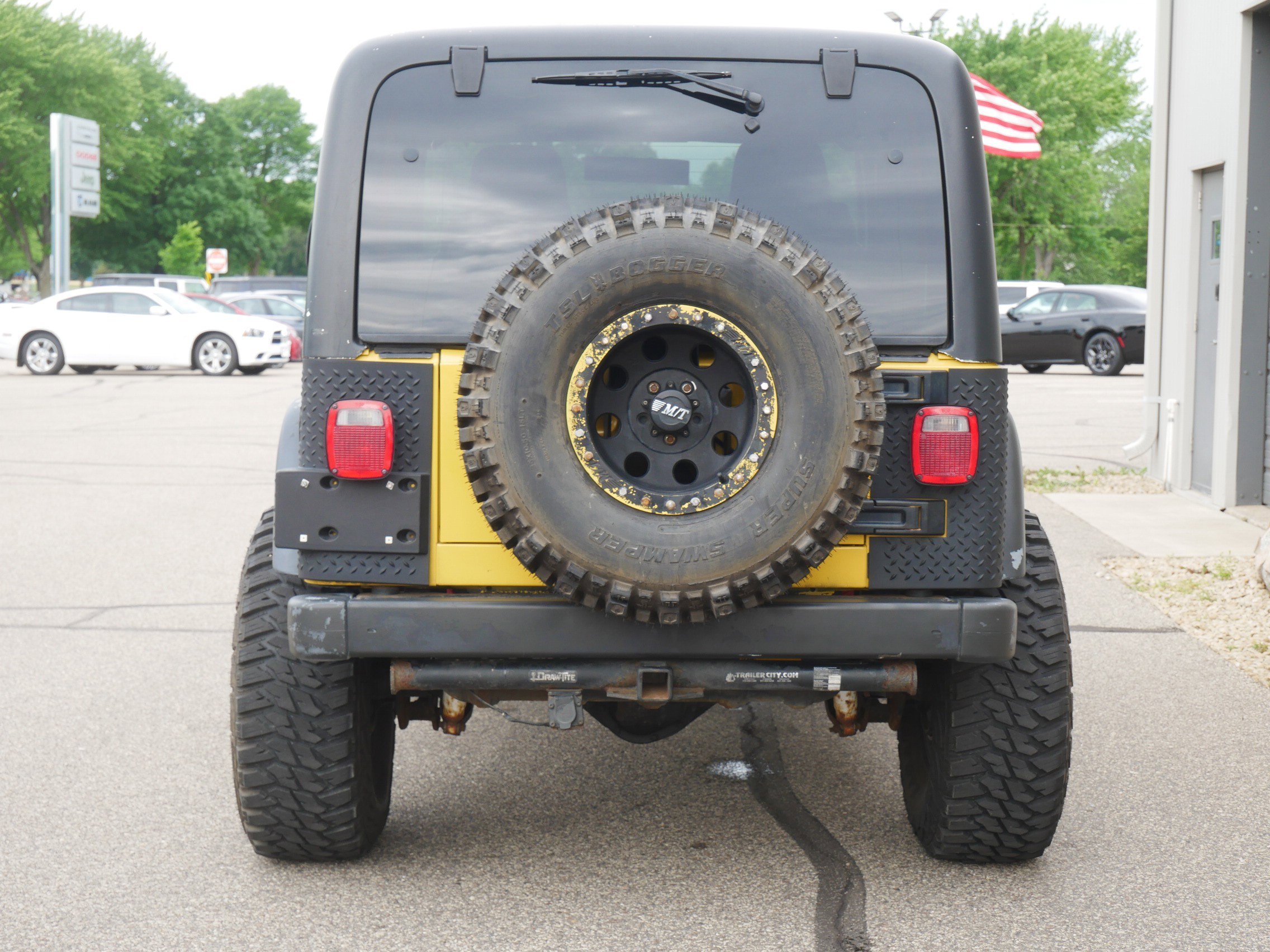 Used 2006 Yellow Jeep Sport image 4