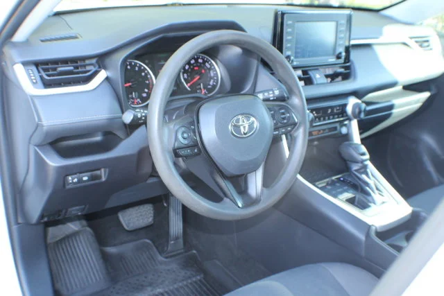 Used 2021 Super White Toyota LE image 7