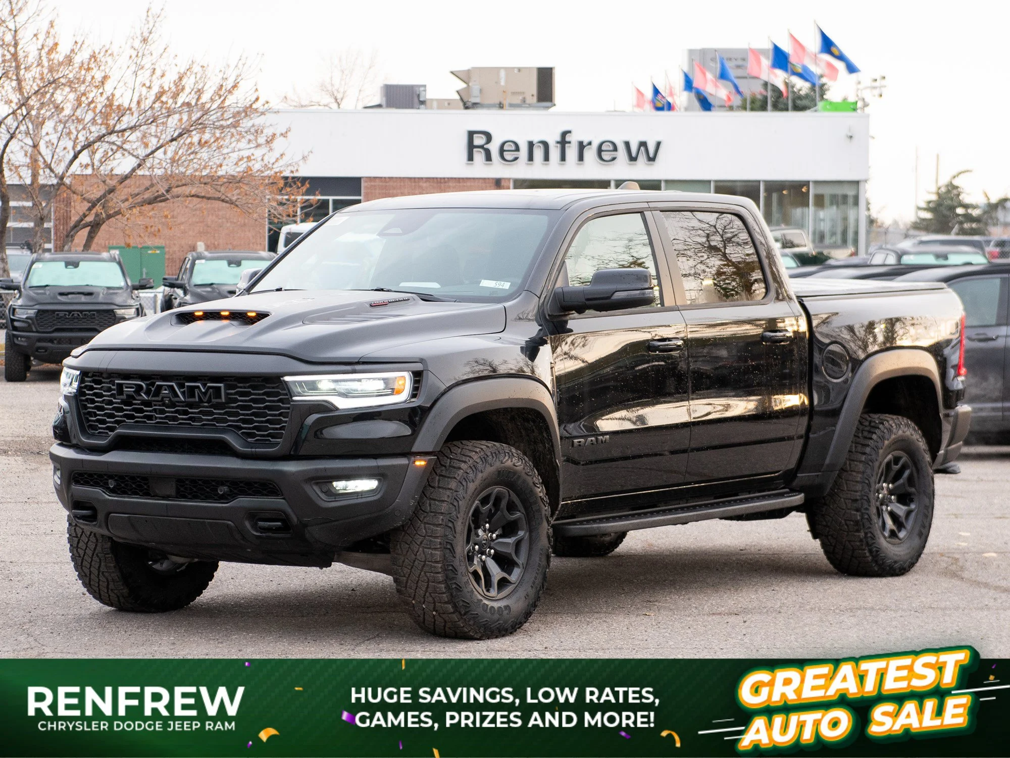 New 2026 Black RAM RHO* Crew Cab 4x4, 540HP, 35 Inch Tires, Massage Seats, Passenger Screen image 1