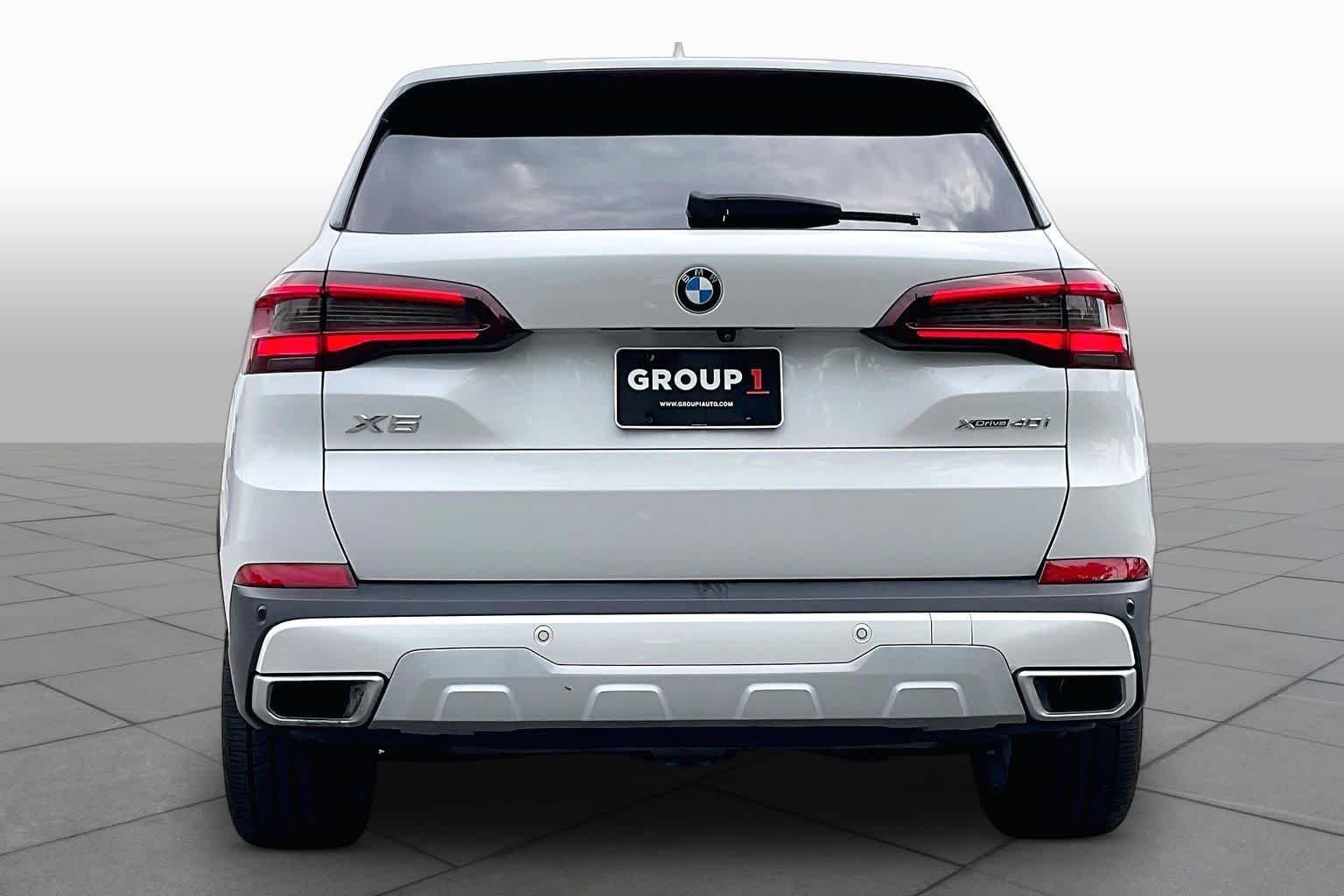 Used 2022 Mineral White Metallic BMW xDrive40i image 4