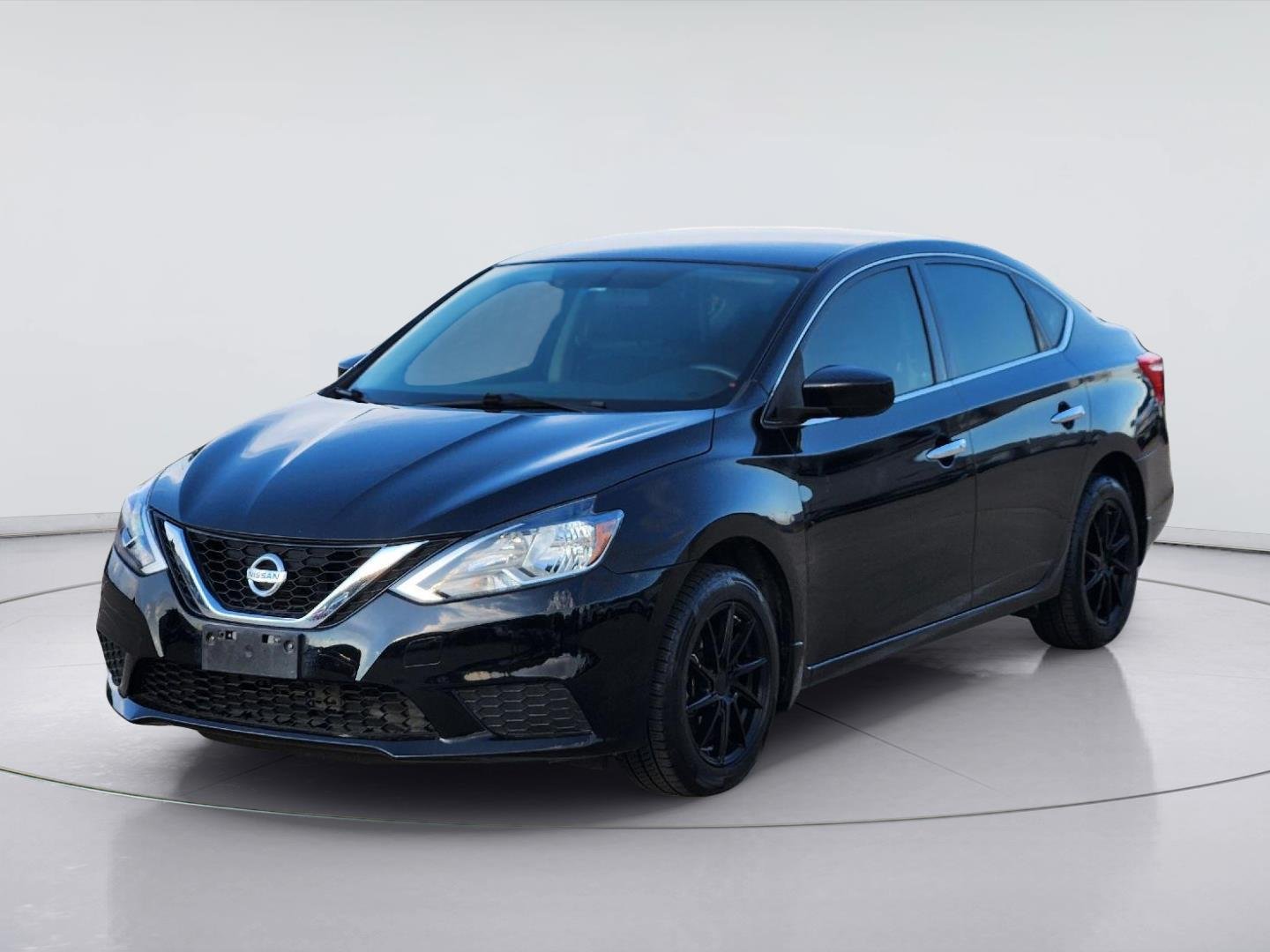 Used 2016 Super Black Nissan SV image 3
