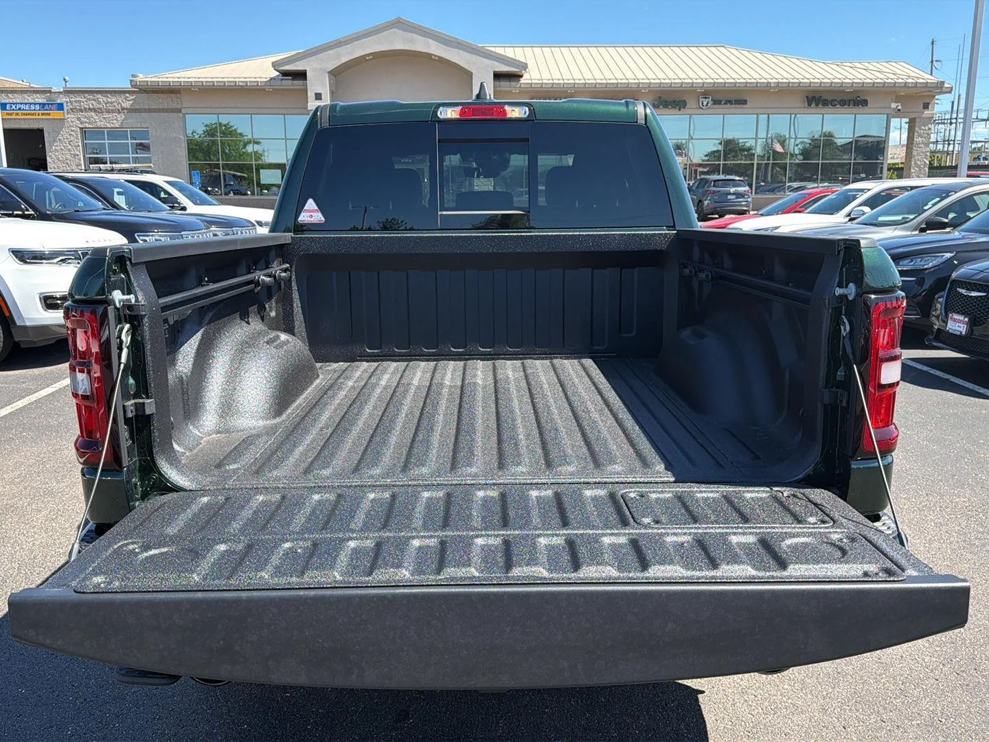 New 2026 Serrano-Green Metallic Exterior Paint RAM Laramie image 21