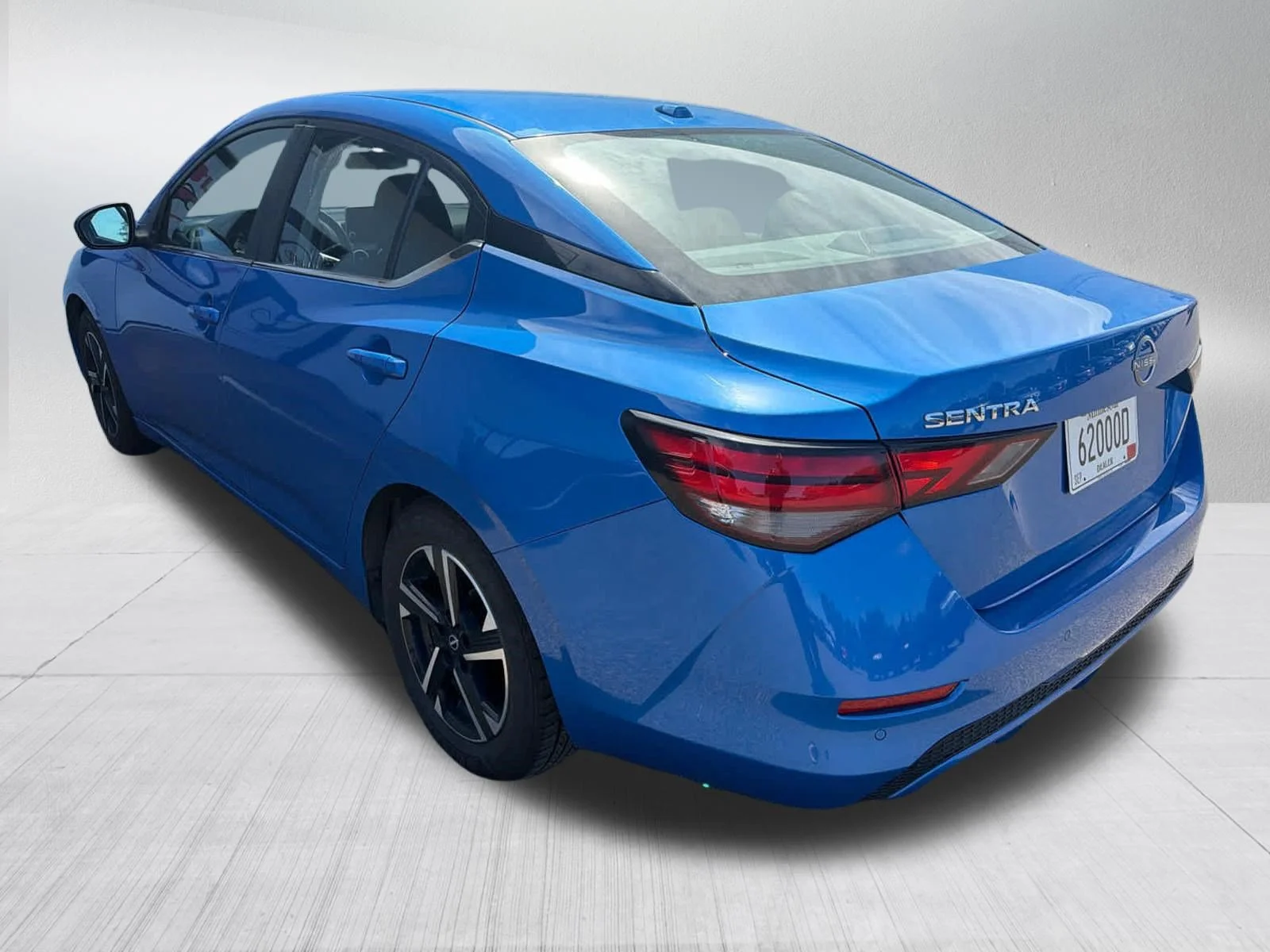 Used 2025 Electric Blue Metallic Nissan SV image 2