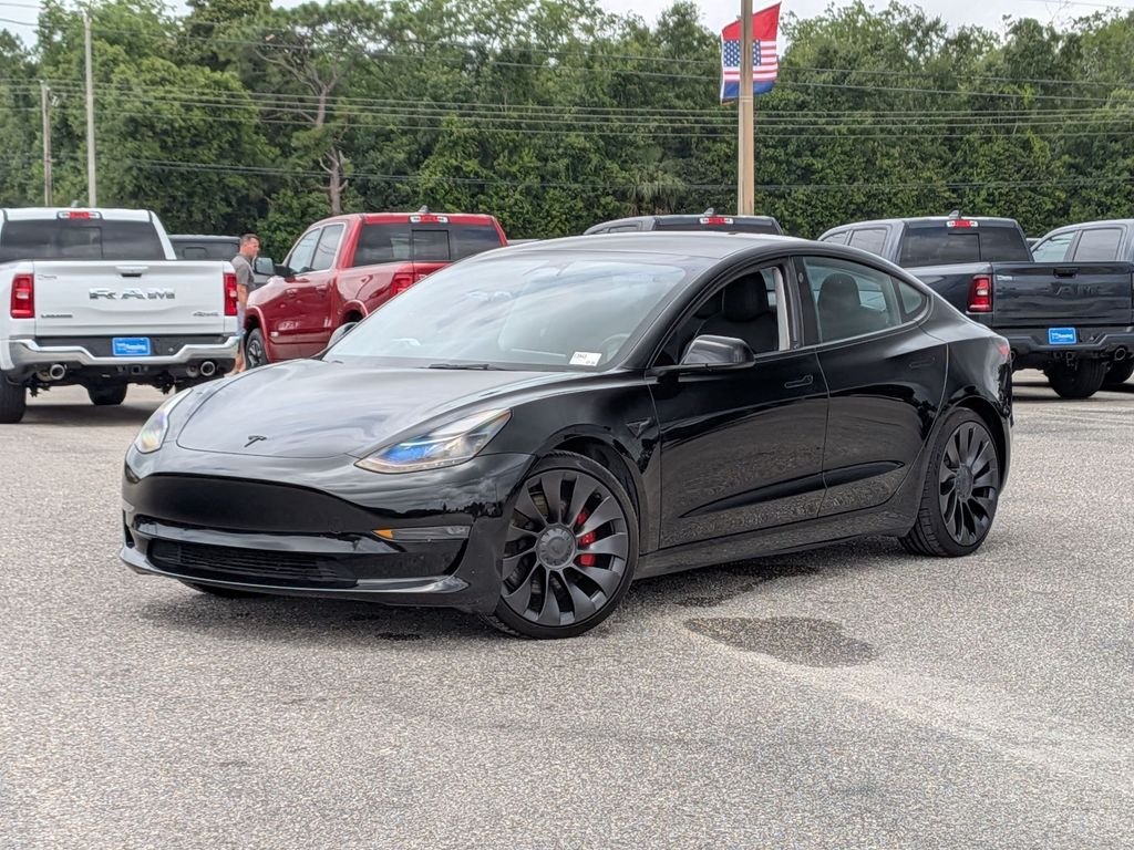 Used 2023 Black Tesla Performance image 1