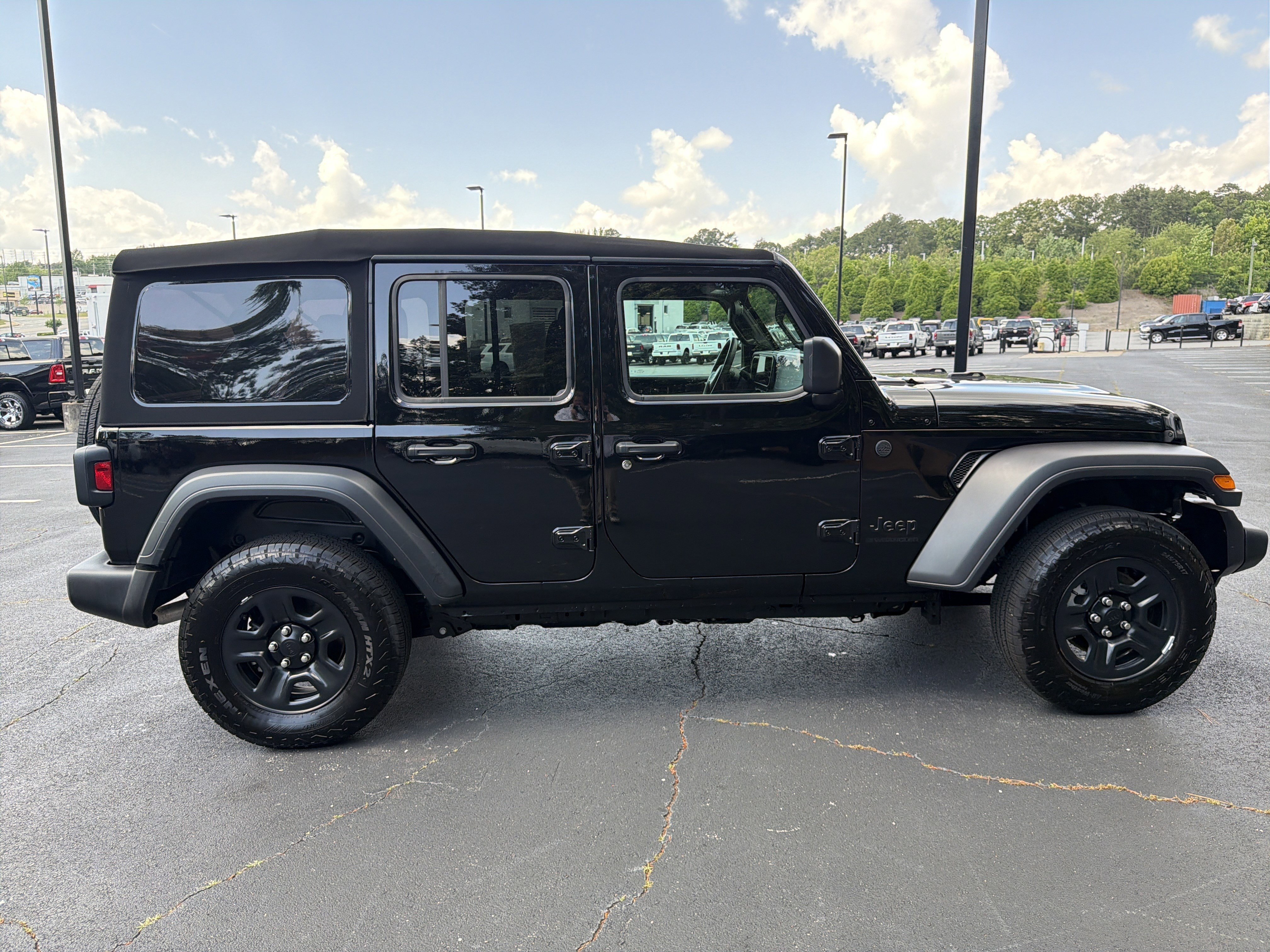 Used 2025 Black Clearcoat Jeep Sport image 9