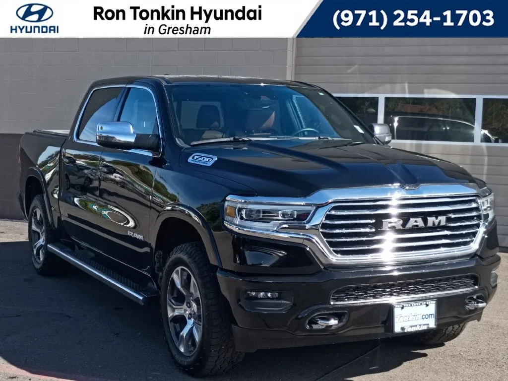 Used 2023 Diamond Black Crystal Pearlcoat Ram Laramie Longhorn image 1