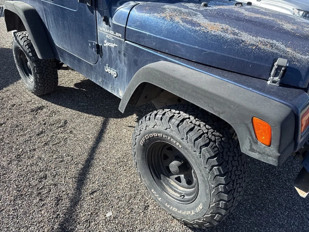 Used 2000 Jeep Wrangler SPORT with VIN 1J4FA49S0YP776709 for sale in Delta, CO