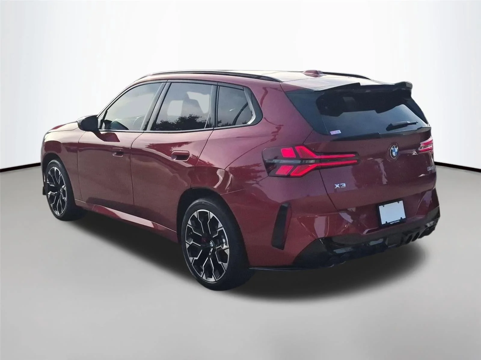 Used 2025 Vegas Red Metallic BMW M50 xDrive image 3