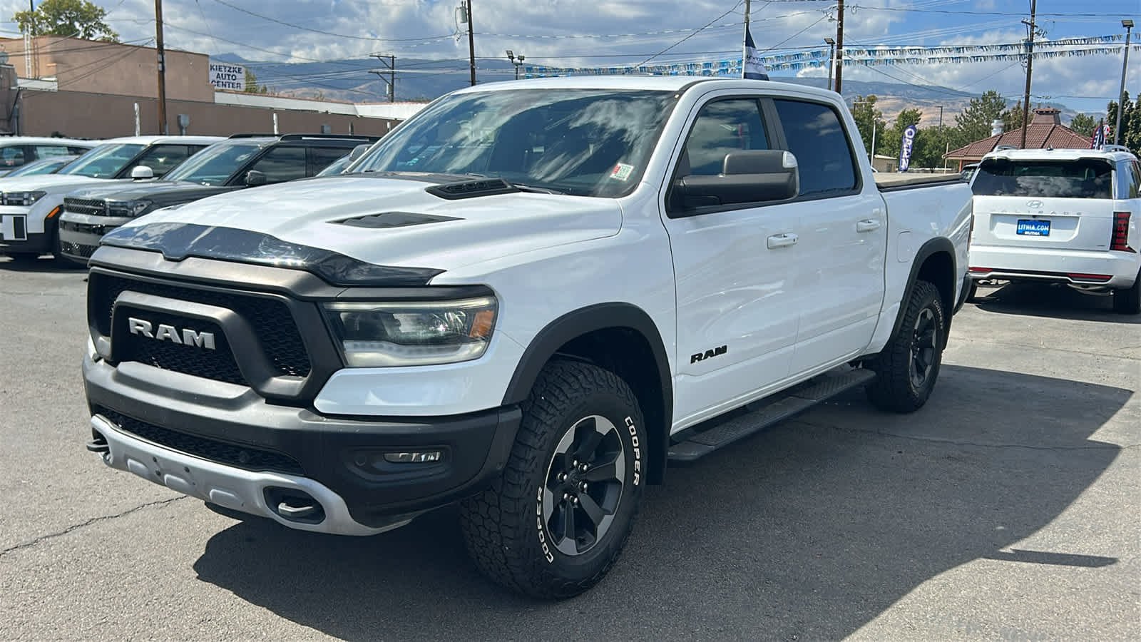 Used 2019 Bright White Ram Rebel image 1