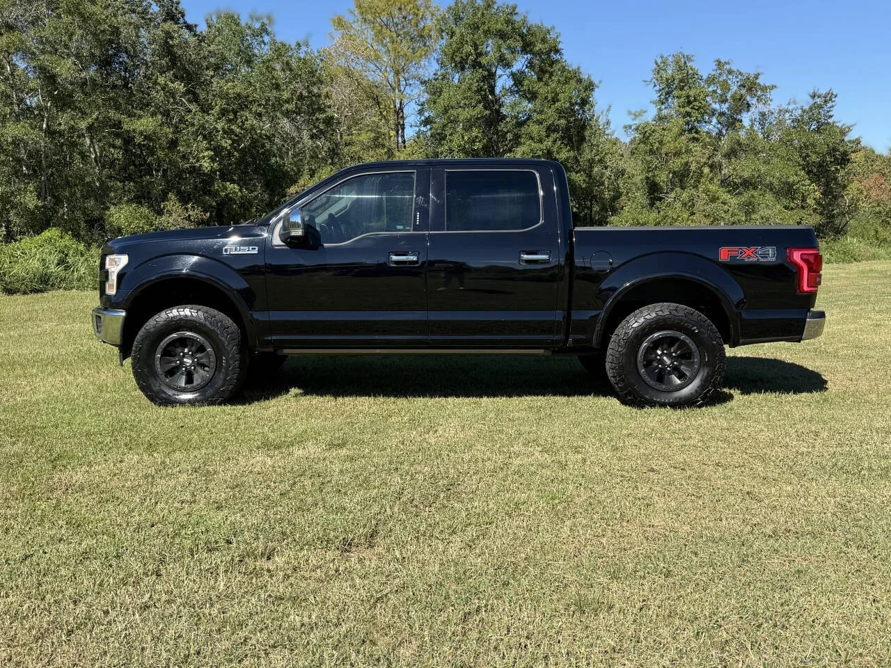 Used 2017 Black Ford Lariat 4x4 4dr SuperCrew 5.5 ft. SB image 2