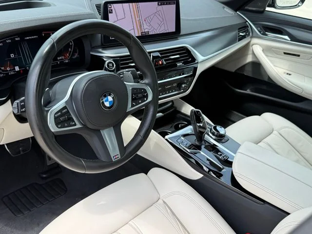 Used 2023 Black BMW M550i xDrive image 9
