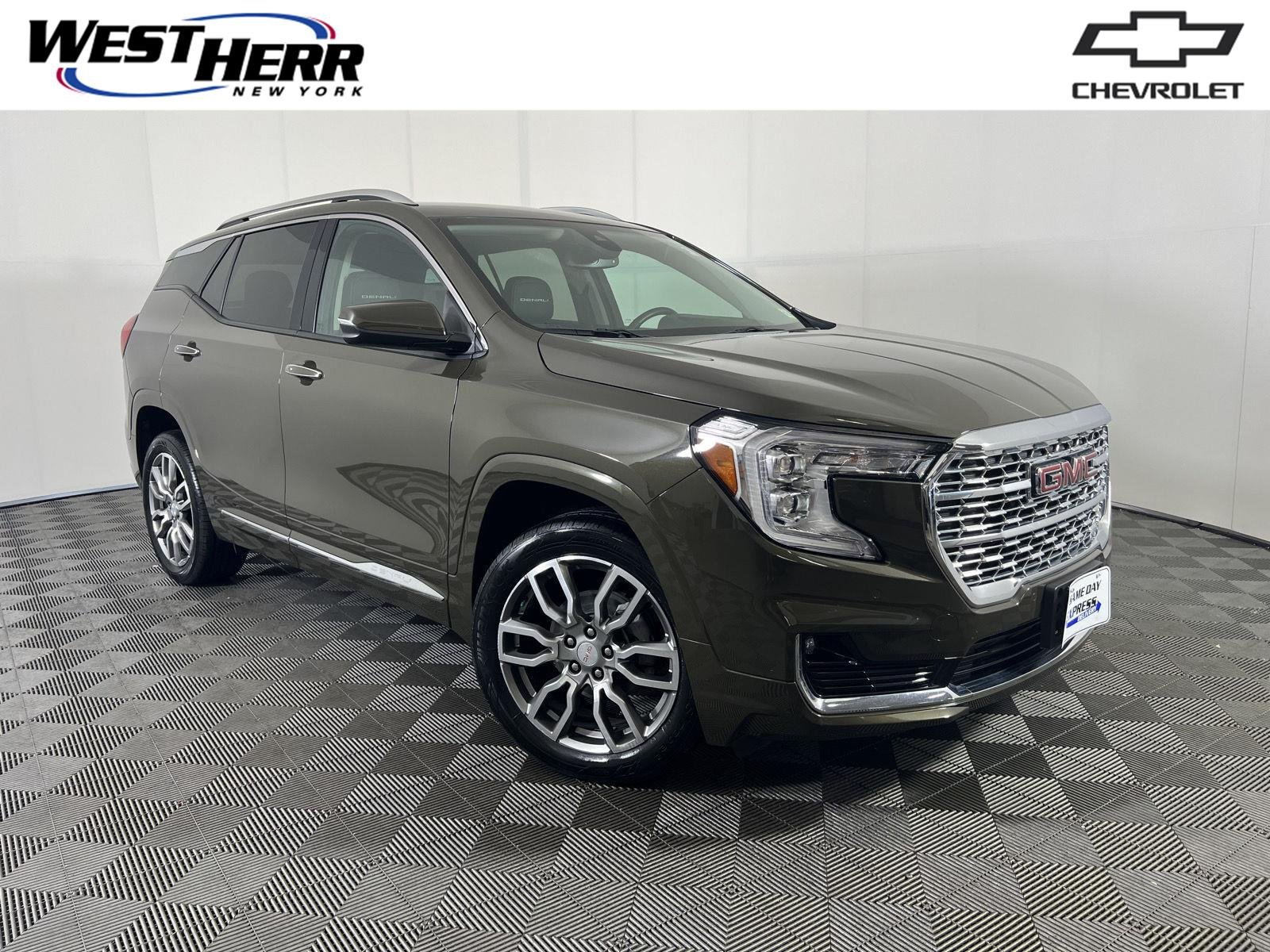 Used 2023 Deep Bronze Metallic GMC Denali image 1