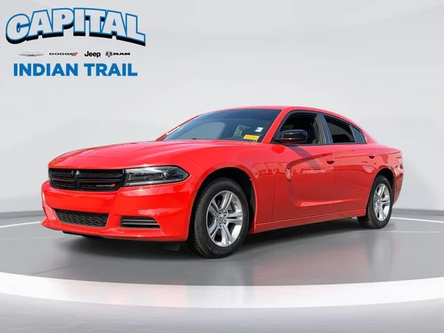 Used 2023 Orange Dodge SXT image 1