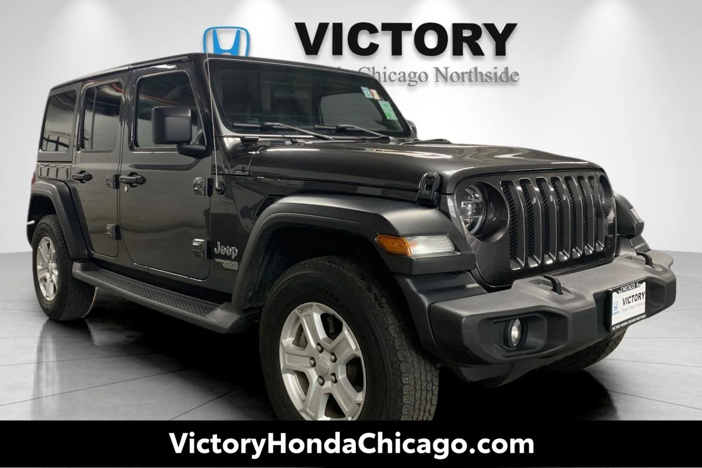 Used 2021 Crystal Metallic Jeep Unlimited Sport S image 1