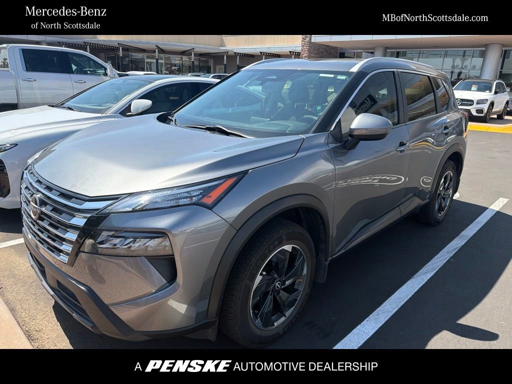 Used 2024 Gun Metallic Nissan SV image 1