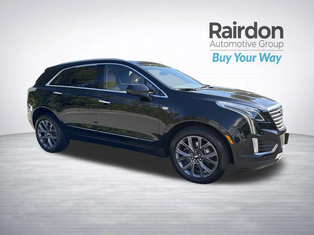Used 2019 Black Cadillac Platinum AWD image 1