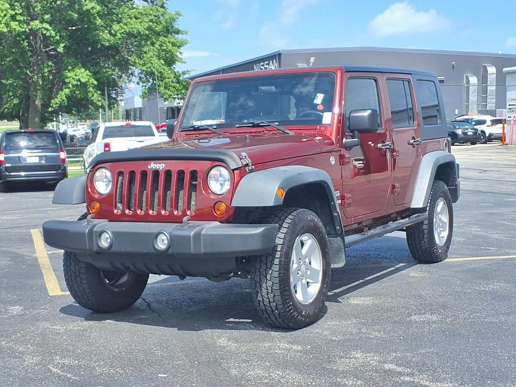 Used 2010 Jeep Wrangler Unlimited Sport with VIN 1J4BA3H1XAL209244 for sale in Olathe, KS