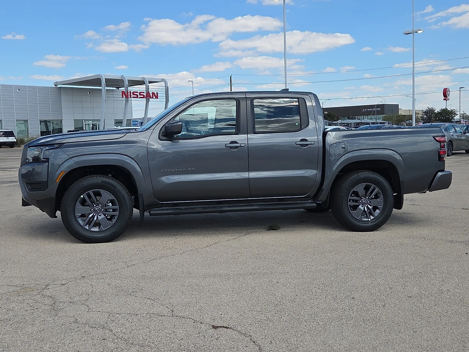 New 2027 KAD Gun Metall Nissan SV 4x2 Crew Cab 5 ft. box 126 in. WB image 2