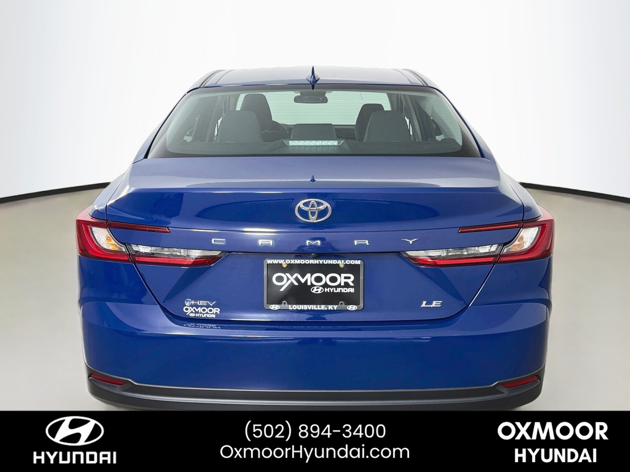Used 2025 Reservoir Blue Toyota LE image 6
