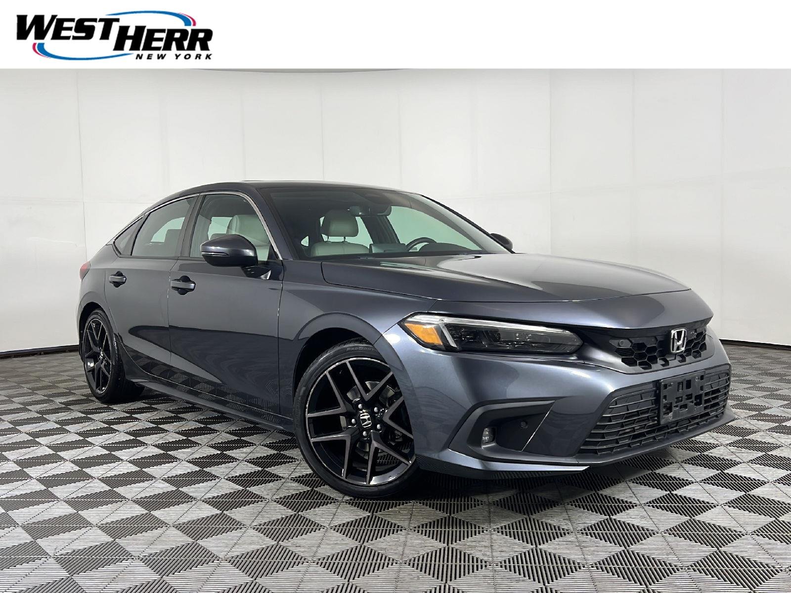 Used 2023 Meteorite Gray Metallic Honda Sport Touring image 1