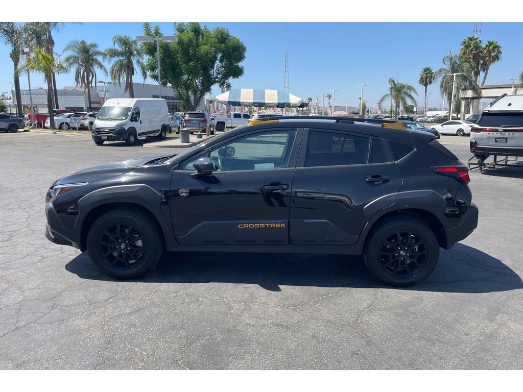 Used 2024 CRYSTAL BLACK SIL Subaru Wilderness image 2