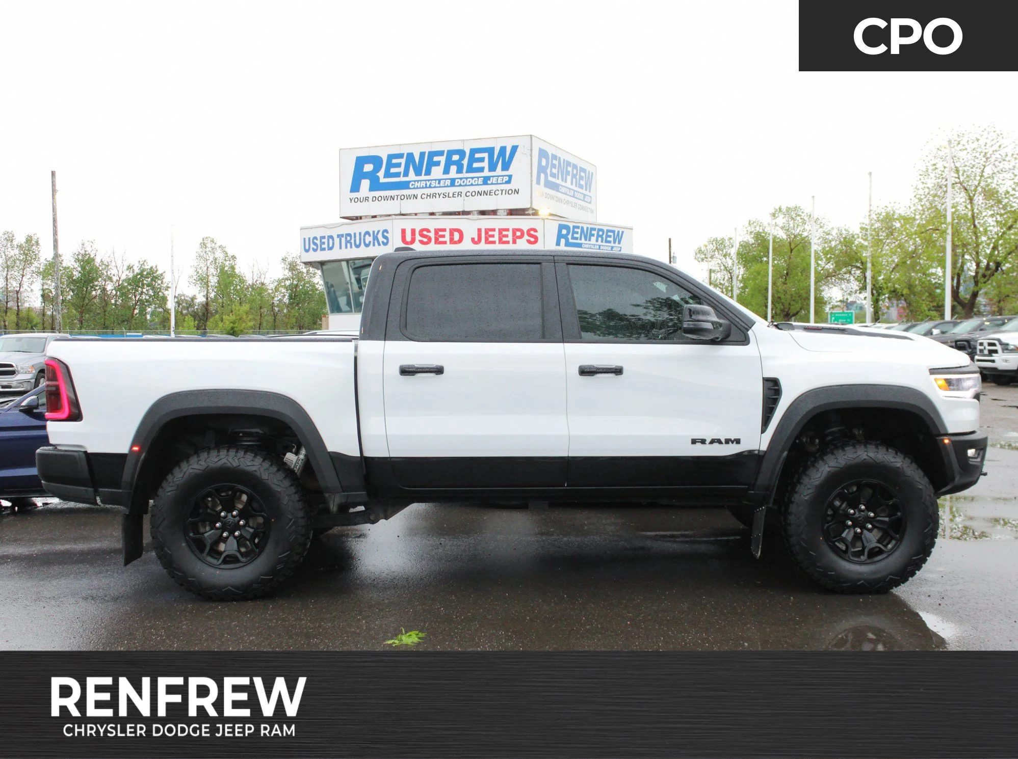 Certified Used 2025 White RAM RHO | Twin-Turbo 540 2.5 LIFT ON 37 TIRES  | Head-Up Display | Bedliner image 1
