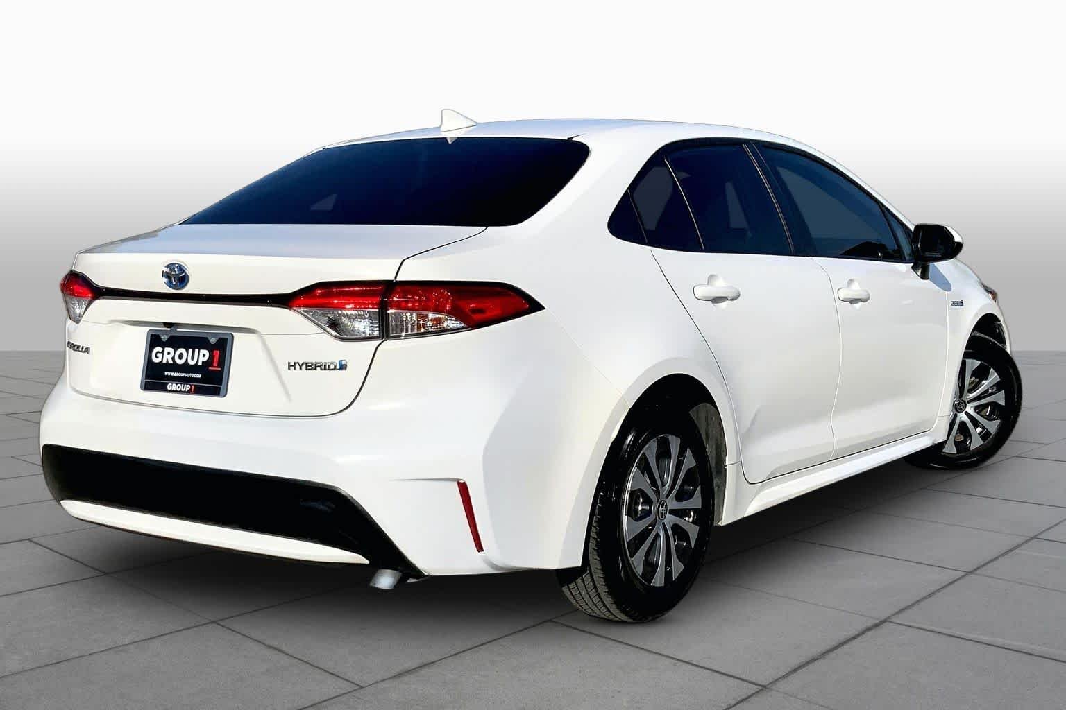 Used 2020 Super White Toyota Hybrid LE image 13