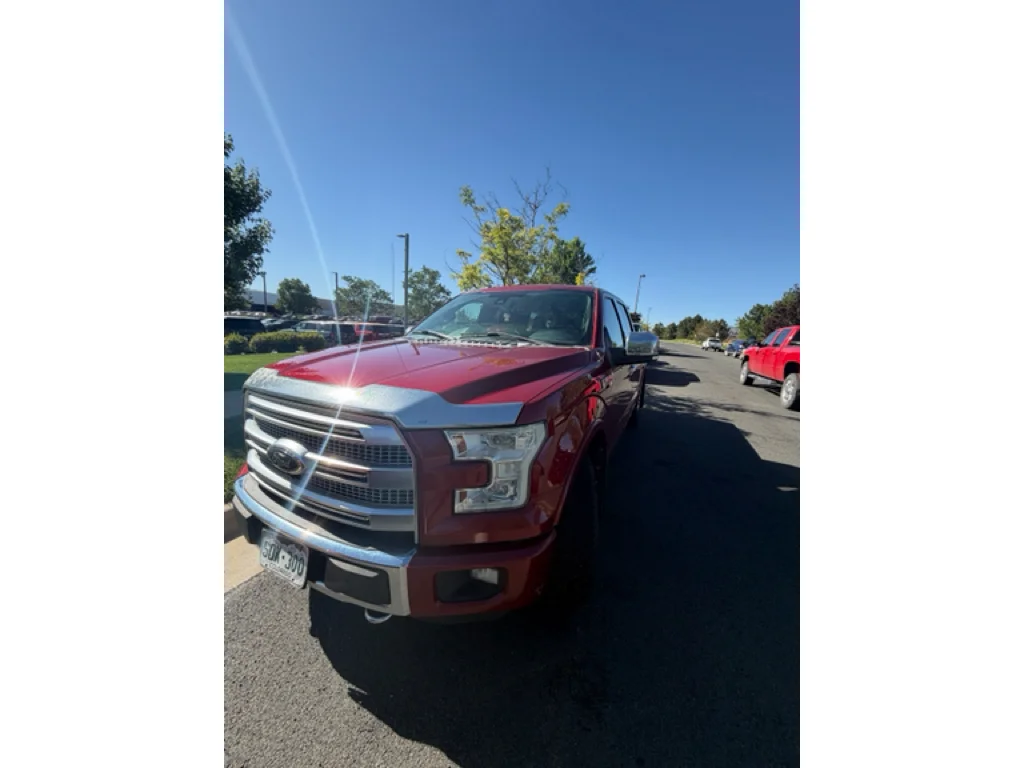 Used 2015 Ruby Red Metallic Tinted Clearcoat Ford Platinum image 1