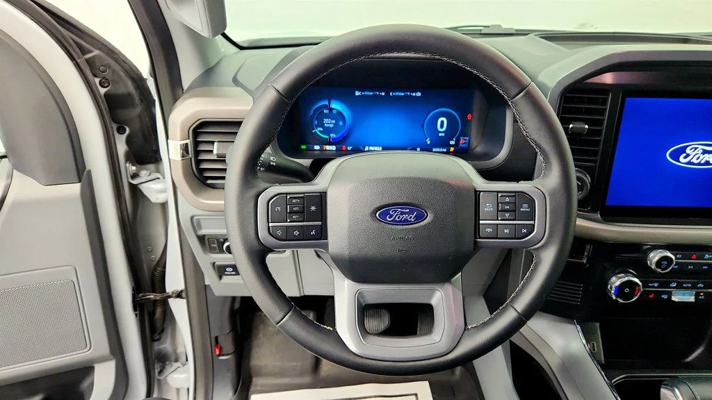 Used 2025 Space White Metallic Ford XLT 4WD SuperCrew 5.5