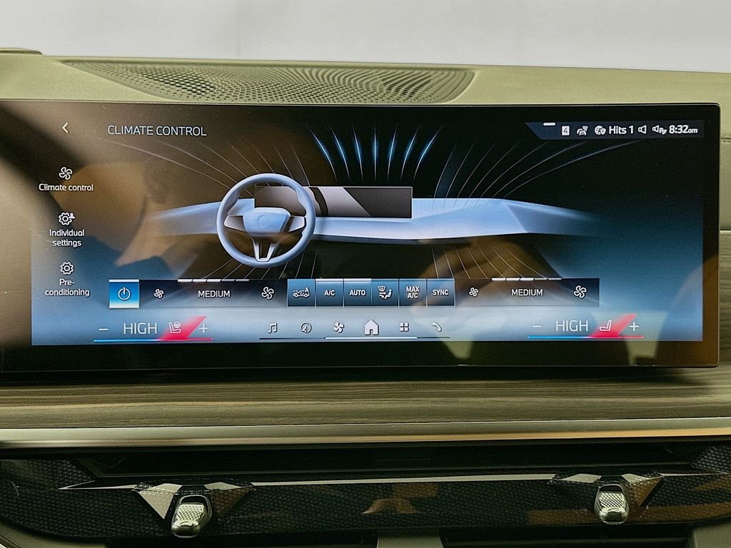 Used 2026 Tanzanite Blue II Metallic BMW xDrive50e image 14