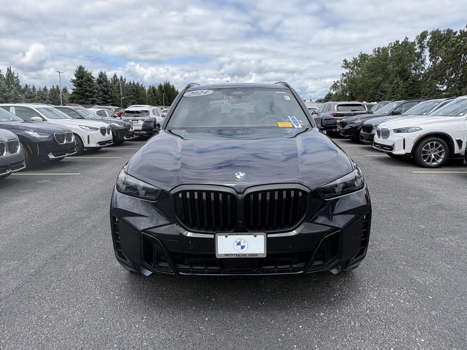 Used 2024 Carbon Black Metallic BMW xDrive40i image 2