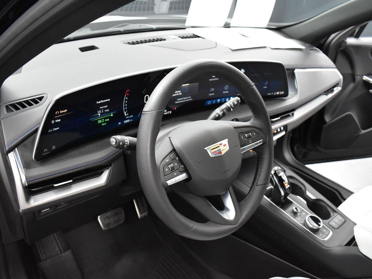 Used 2024 Stellar Black Metallic Cadillac Sport image 14